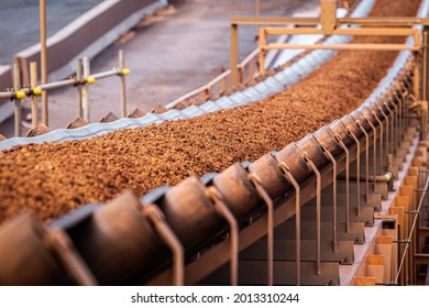 conveyor belt moving iron ore - Shutterstock ID 2013310244