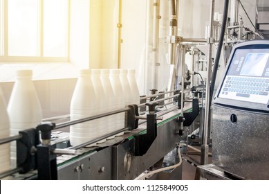 Conveyor Belt With White Milk Bottles