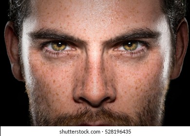 Conviction focused determined passionate confident powerful eyes stare intense athlete exercise trainer male
