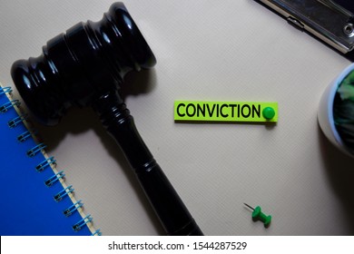 Conviction Text On Sticky Notes And Gavel Isolated On Office Desk. Justice Law Concept