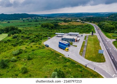 convoys with cargo in the parking lot. trucks on the higthway. cargo delivery. trucker rest on the road. seen from the air. Aerial view landscape. drone photography. 