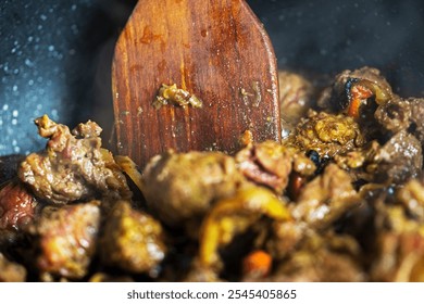 cook beef and veal slices with onions and carrots. Festive dinner - Powered by Shutterstock