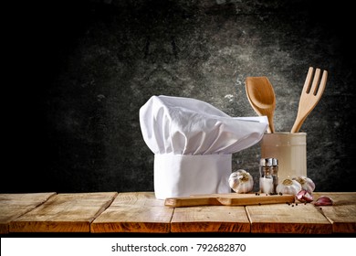 Cook hat and wooden table of free space  - Shutterstock ID 792682870