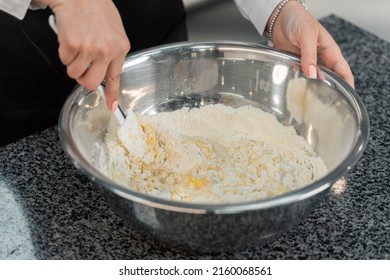 The Cook Is Kneading The Dough. Flour And Egg