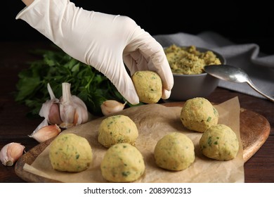 Cook Making Falafel Balls At Wooden Table, Closeup