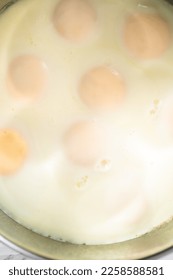 Cook no-peel hard-boiled eggs in a pressure cooker. - Shutterstock ID 2258588581