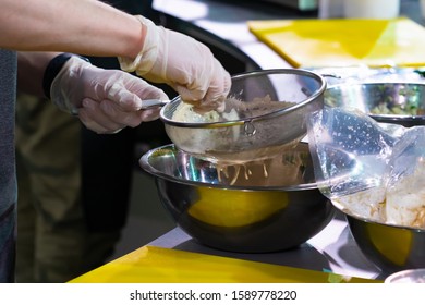 Cook Preparing Sauce Sifting Through Sieve Stock Photo 1589778220 ...