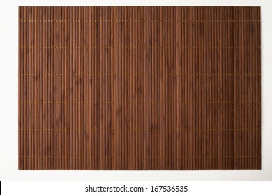 Cookbook Background/Cookbook Background Table. Brown Wooden Mat On White Kitchen Table.