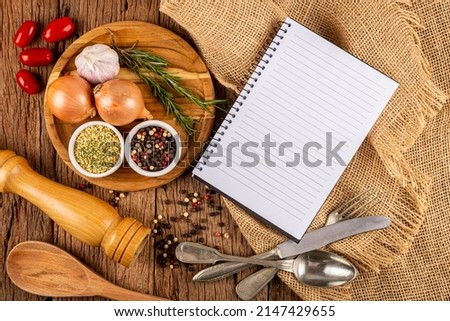 Cookbook with ingredients on the table.Recipe book.