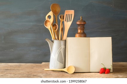 Cookbook Or Recipe Book With Wooden Spoons And Strawberries, Mockup W. Free Copy Space