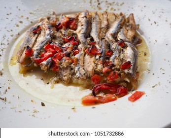 Cooked Anchovies In Olive Oil With Roasted Bell Peppers