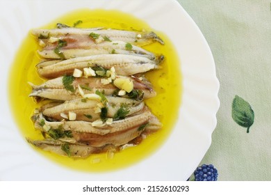 Cooked Anchovies In Vinegar On The Plate Spanish Food. Photo Top View 