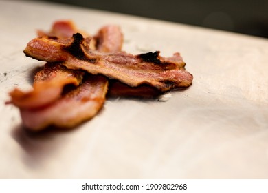 Cooked Bacon On A Stainless Steel Worktop