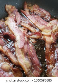 Cooked Bacon Strips In Grease