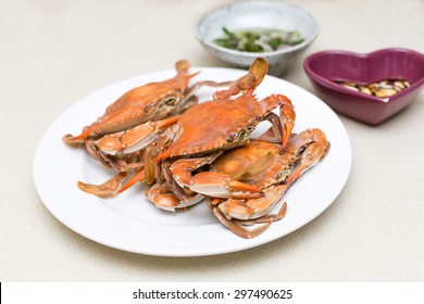 Cooked Blue Crabs On White Plate