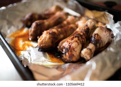 Cooked Chicken Drumsticks On Tin Foil