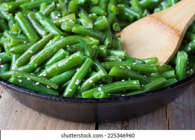 Cooked Green Beans With Sesame Seeds In Frying Pan