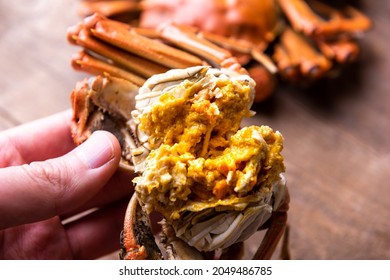 Cooked hairy crabs on the table, Closeup. The hairy crab and rich crab cream. - Shutterstock ID 2049486785