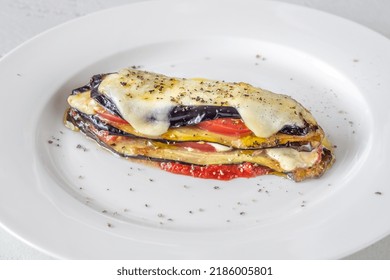 Cooked Italian Eggplant Parmigiana On The Plate