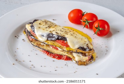 Cooked Italian Eggplant Parmigiana On The Plate