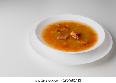 Cooked Legumes And Vegetables In A Bowl. Ribollita Traditional Tuscany Dry Pea Soup With Chopped Green Peas, Pork, Bacon. German Split Pea Soup With Bacon.