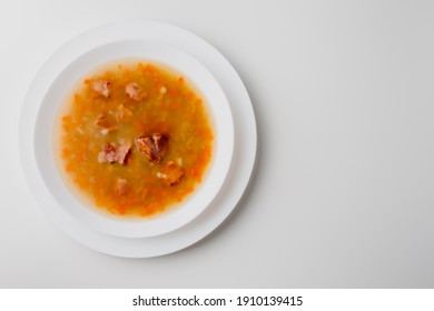 Cooked Legumes And Vegetables In A Bowl. Ribollita Traditional Tuscany Dry Pea Soup With Chopped Green Peas, Pork, Bacon. German Split Pea Soup With Bacon.