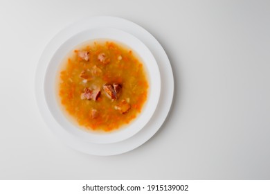 Cooked Legumes And Vegetables In A Bowl. Ribollita Traditional Tuscany Dry Pea Soup With Chopped Green Peas, Pork, Bacon. German Split Pea Soup With Bacon.