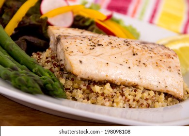 Cooked Mahi Mahi Fish Fillet Dish On Quinoa With Vegetables 