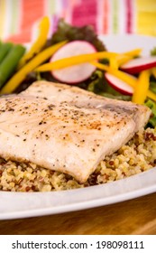 Cooked Mahi Mahi Fish Fillet Dish On Quinoa With Vegetables 