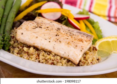 Cooked Mahi Mahi Fish Fillet Dish On Quinoa With Vegetables 