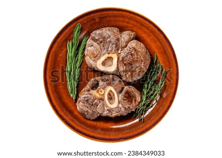 Cooked meat on the bone Osso Buco veal shank, italian ossobuco steak. Isolated on white background