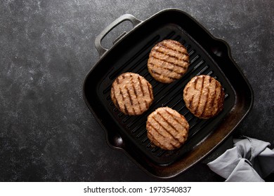 Cooked Minced Beef Patty On Grill Pan. Cooking Homemade Burger