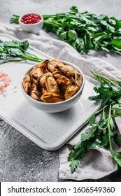 Cooked Mussel Meat On A Cutting Board With Parsley. Healthy Seafood.