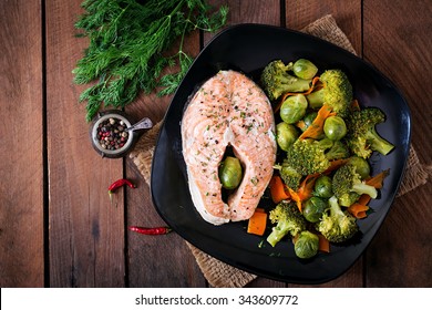 Cooked On Steam Salmon Steak With Vegetables. Top View