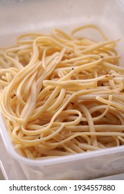 Cooked Plain Pasta Linguine In A Takeaway Plastic Container                           