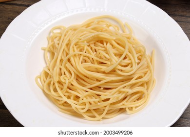 Cooked Plain Spaghetti On White Plate