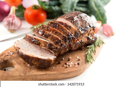 Cooked Pork Loin Roast With Vegetables And Spices