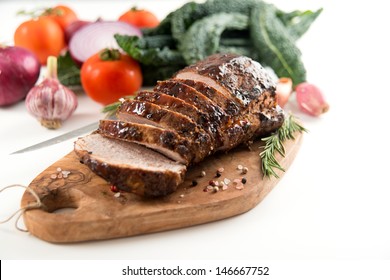 Cooked Pork Loin Roast With Vegetables And Spices 