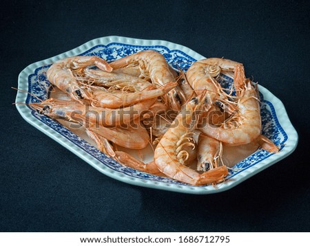 cooked prawns with black background