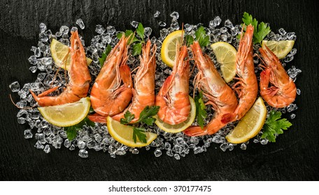 Cooked Prawns Served On Black Stone