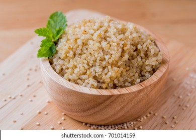 Cooked Quinoa In A Wooden Bowl