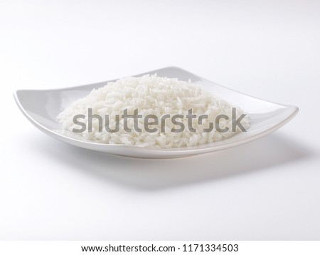 cooked rice on plate and white background        