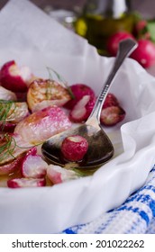 cooked roasted radishes, lying in the form of heat-resistant 