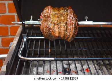 Cooked Rotisserie Beef On Charcoal Barbecue The Turning Action Helps Hold In The Moisture So It Doesn't Need Marinating Or Basting Simple Seasonings Like Salt And Pepper Let The Meat Flavour Stand Out