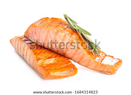 Cooked salmon fillet on white background