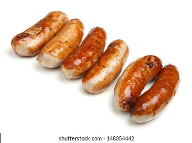 Cooked sausages arranged in a row,