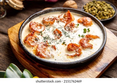 Cooked Shrimp With Creamy Garlic Sauce On Table