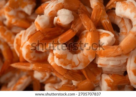 Cooked shrimp macro texture closeup. Orange prawns delicious seafood dish. High protein gourmet cuisine. Tasty meal for restaurant buffet. Shrimp pattern background foodphoto.