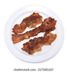 Cooked Slices Of Bacon On White Ceramic Plate Isolated On White Background