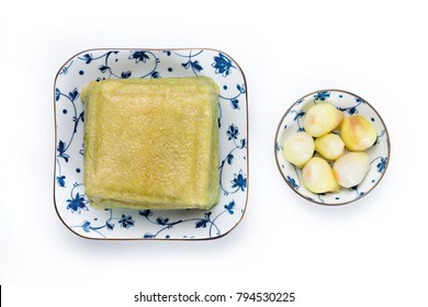 Cooked square glutinous rice cake. Chung cake.
Vietnamese new year food